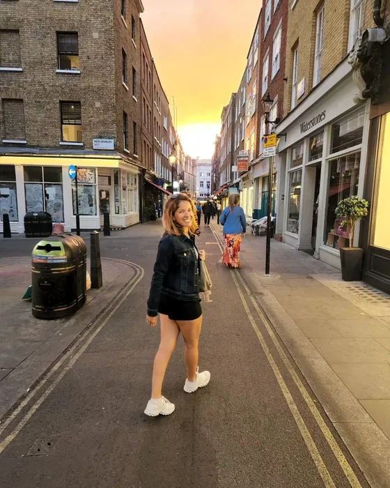 Lucy Meyer walking through a city